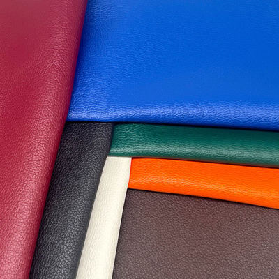 Hurtowa sprzedaż fabryczna PVC 0,6 mm Tekstura liczi Sztuczna skóra tłoczona Syntetyczna skóra ekologiczna do siedzeń samochodowych, toreb, dekoracji stóp