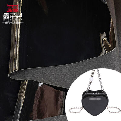 Materiał ze skóry syntetycznej PVC z lustrzanym wykończeniem do torebek, sof, butów, podkładek, mebli, tapicerki siedzeń samochodowych, ozdobnych pasów samochodowych