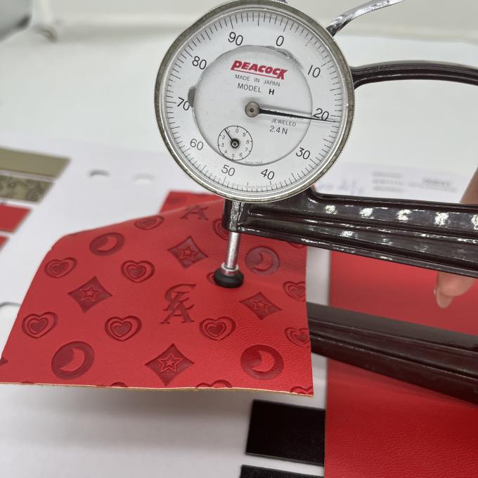 PU tłoczona skóra syntetyczna do torby na buty, opakowania, maty stołowej, tkanina ze skóry syntetycznej 9